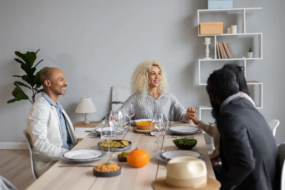 Friends sharing a meal around a table